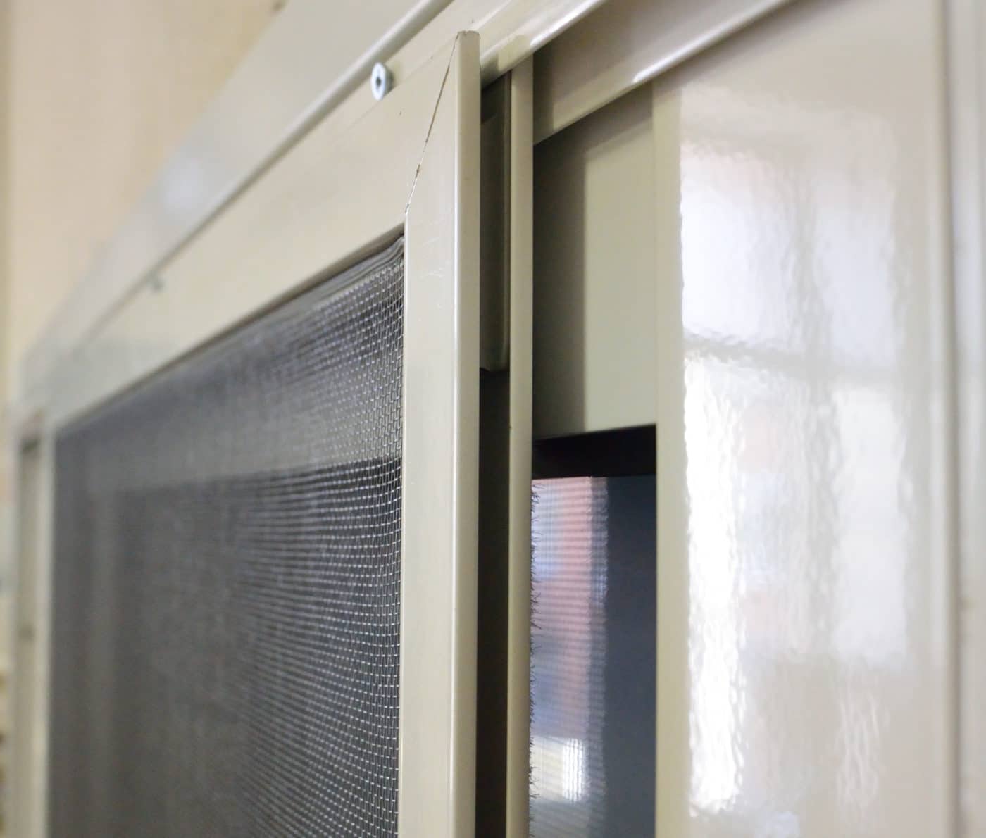 A close up of a door with an energy-efficient screen.