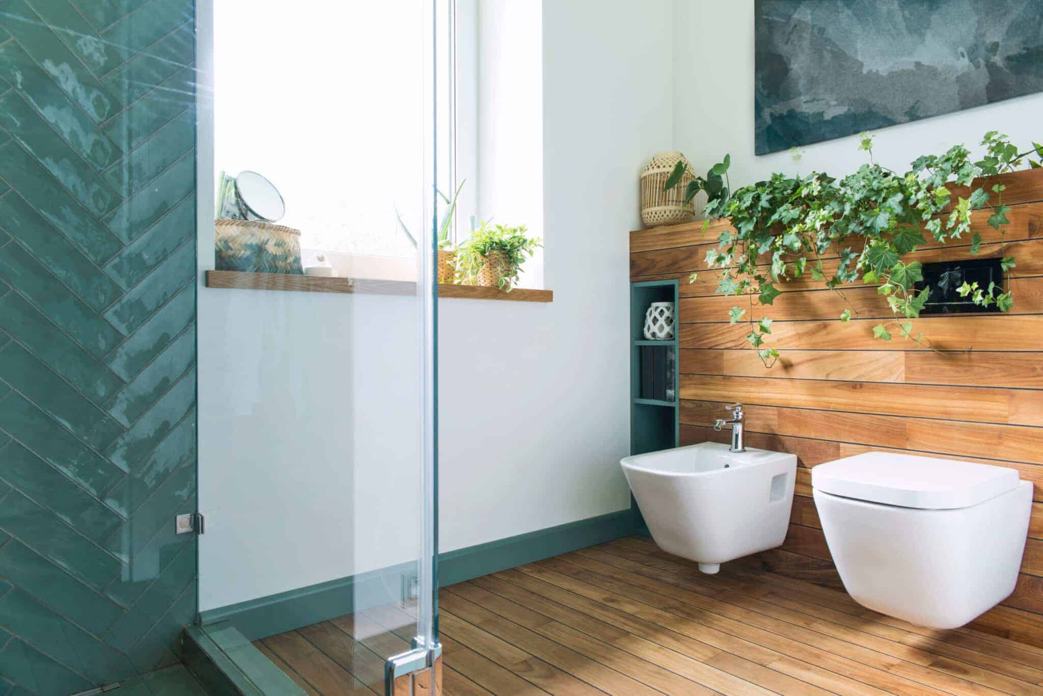 Updated bathroom with natural wood and frameless shower