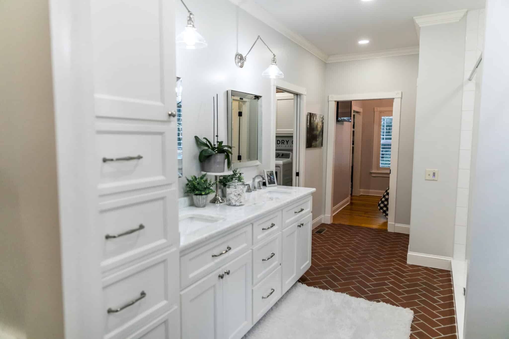 Fresh bathroom remodel with painted cabinets.