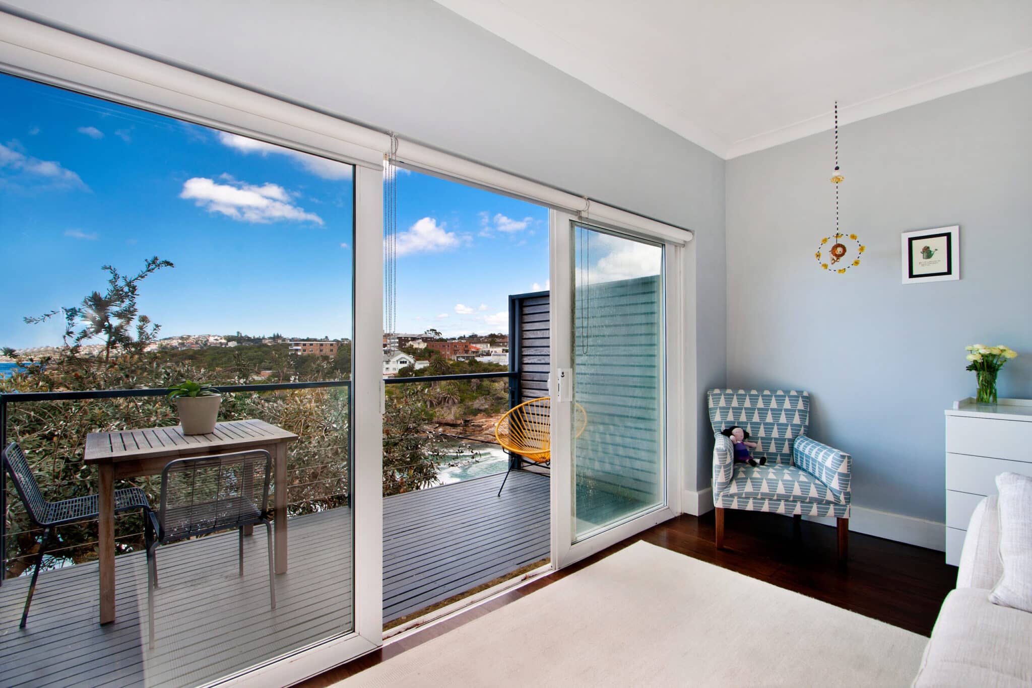 A big sliding glass patio door with a great view.