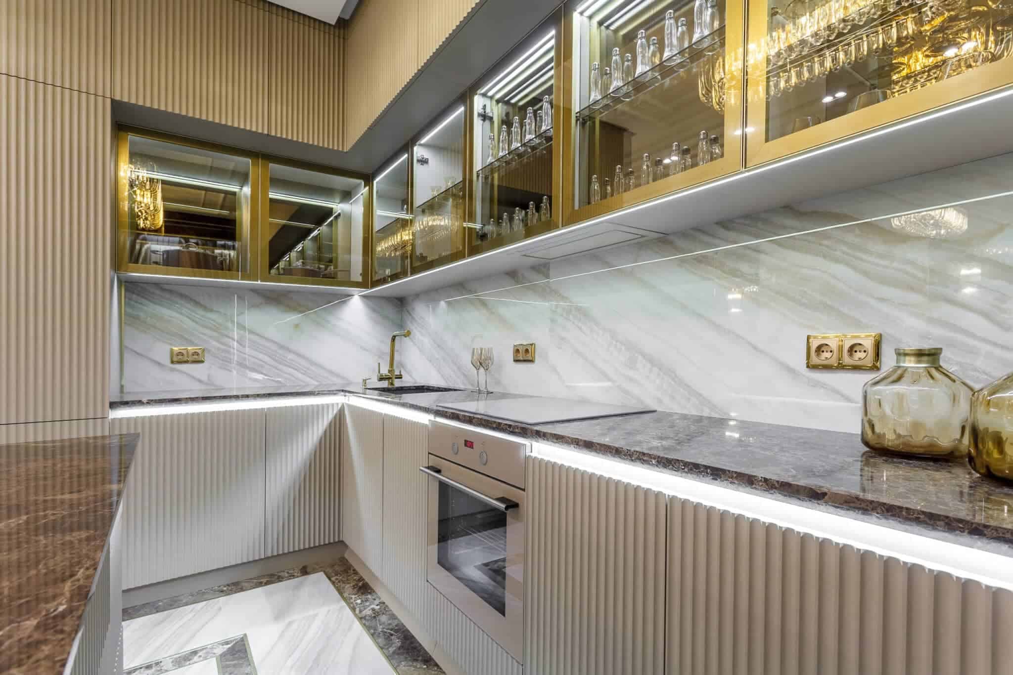 Chic kitchen reno with glass cabinet doors.