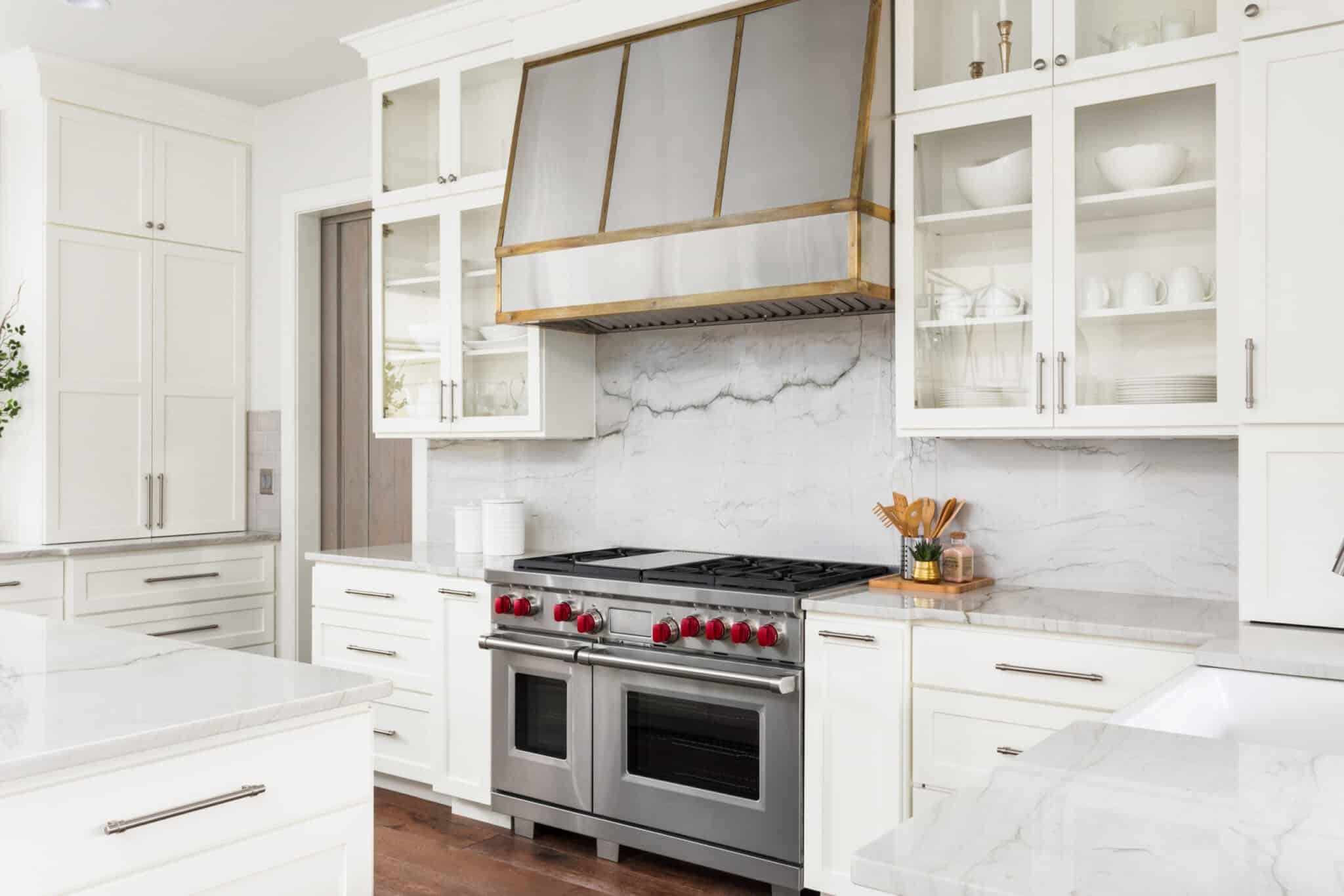White painted glass cabinets in a remodeled kitchen.