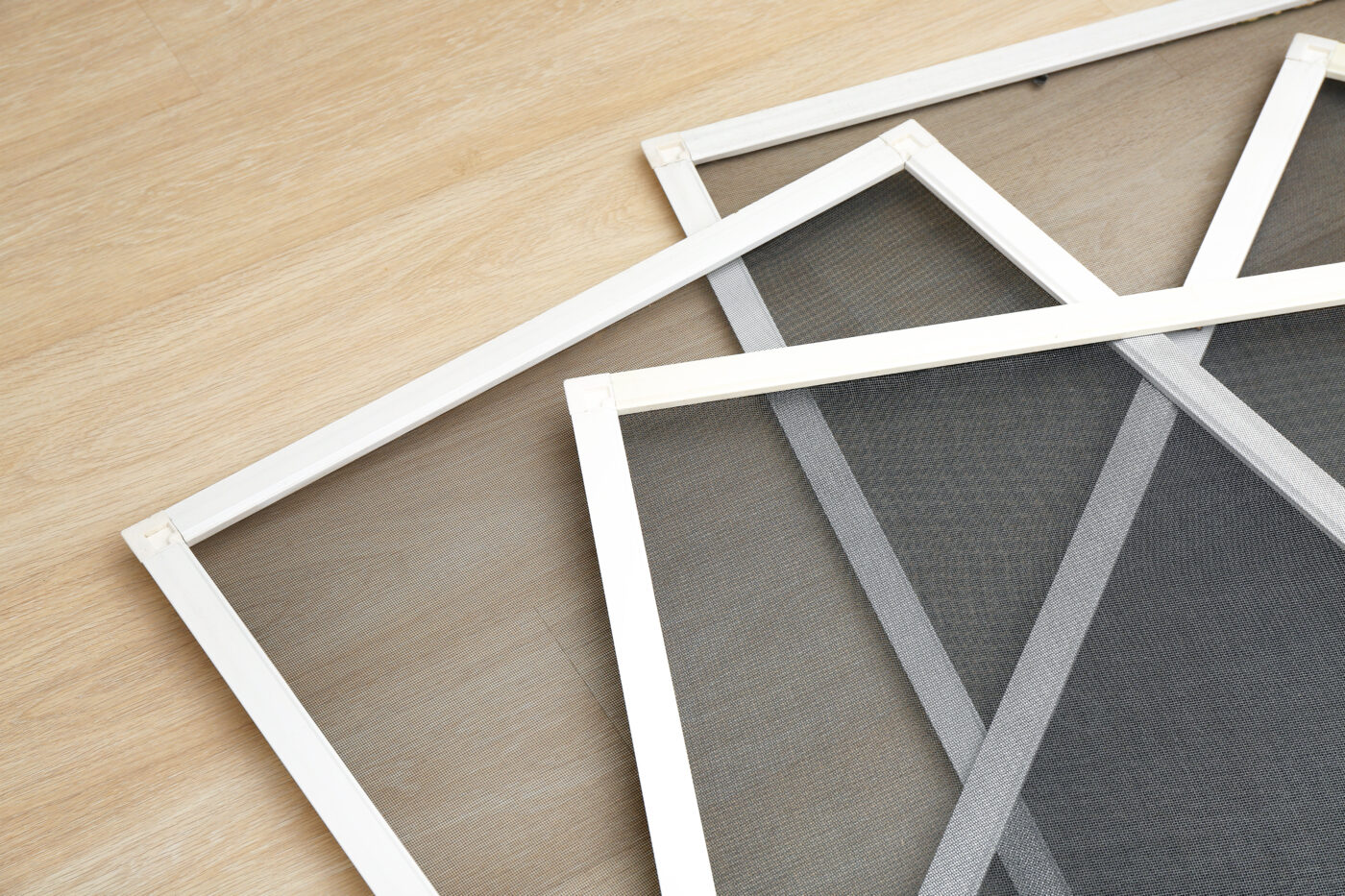 A group of energy-efficient metal frames on a wooden floor.